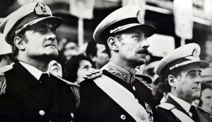Argentine dictator Jorge Videla (R) stands at attention with junta member Admiral Emilio Massera (L) during a ceremony in this 1979 file photo. Massera, aged 85, died November 8, 2010, according local media reports. BLACK AND WHITE ONLY.    REUTERS/Stringer (ARGENTINA - Tags: POLITICS OBITUARY)